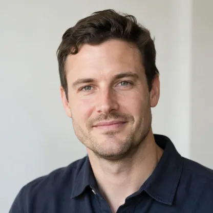 Portrait of a smiling man in a dark jacket